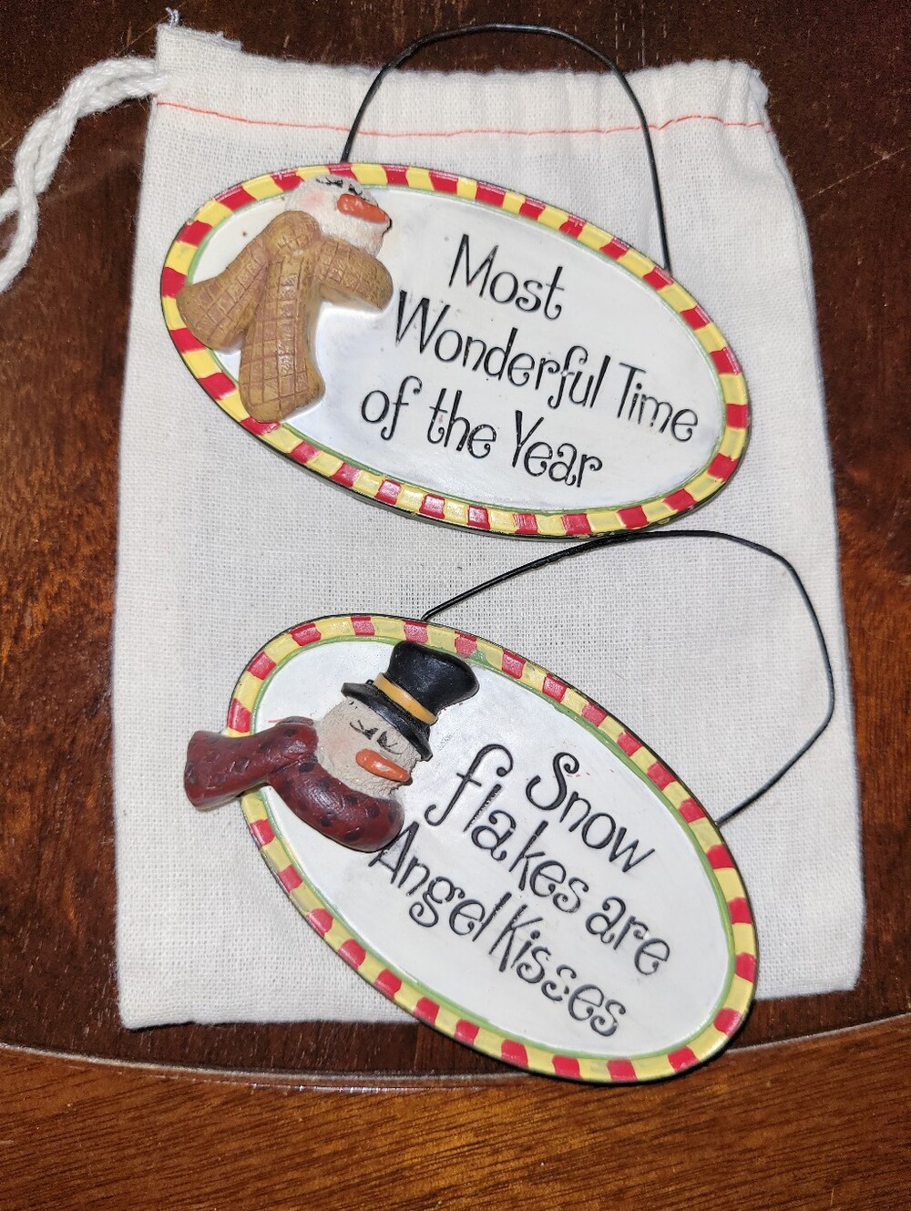 Set of 2 Oval Holiday Hanging Plaques - Snowman & Winter Sayings